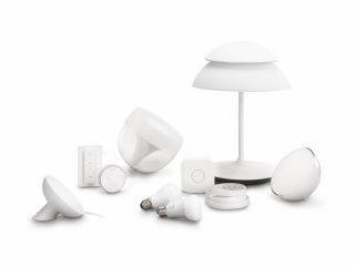"Colección de iluminación LED inteligente Philips Hue con luminarias de mesa, lámparas y dispositivos de control para una iluminación y un ambiente personalizado en casa".